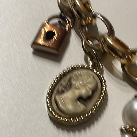 Gold Tone 7 Charms 7β Long Bracelet - Picture 2 of 6